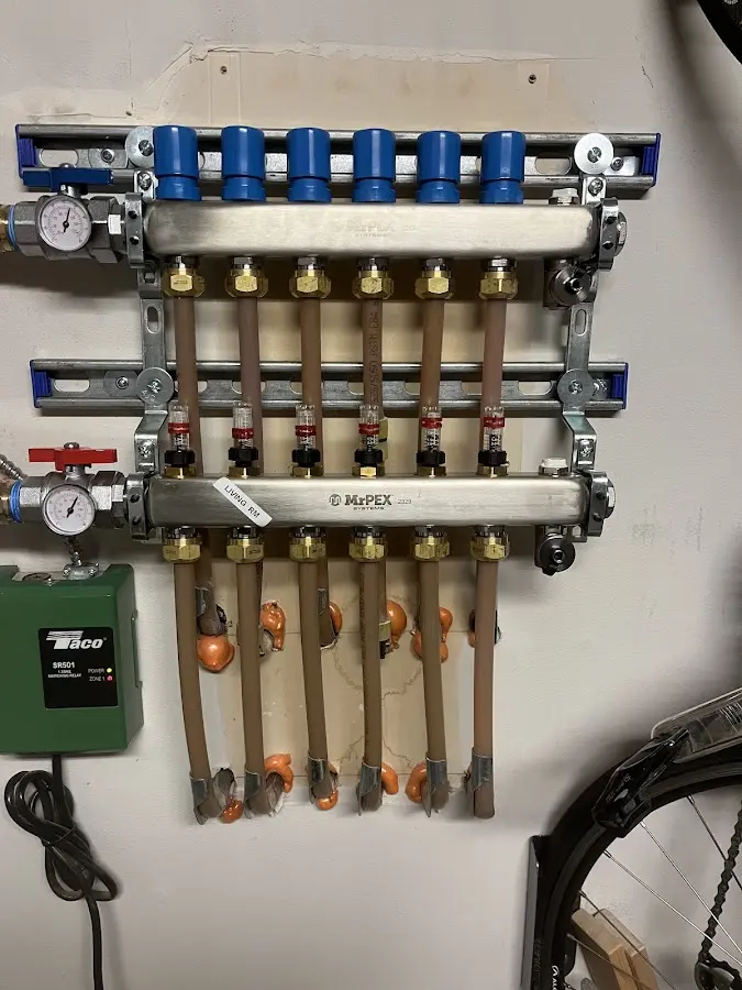 Plumber performing Water Heater Repair at a residential property in Anna